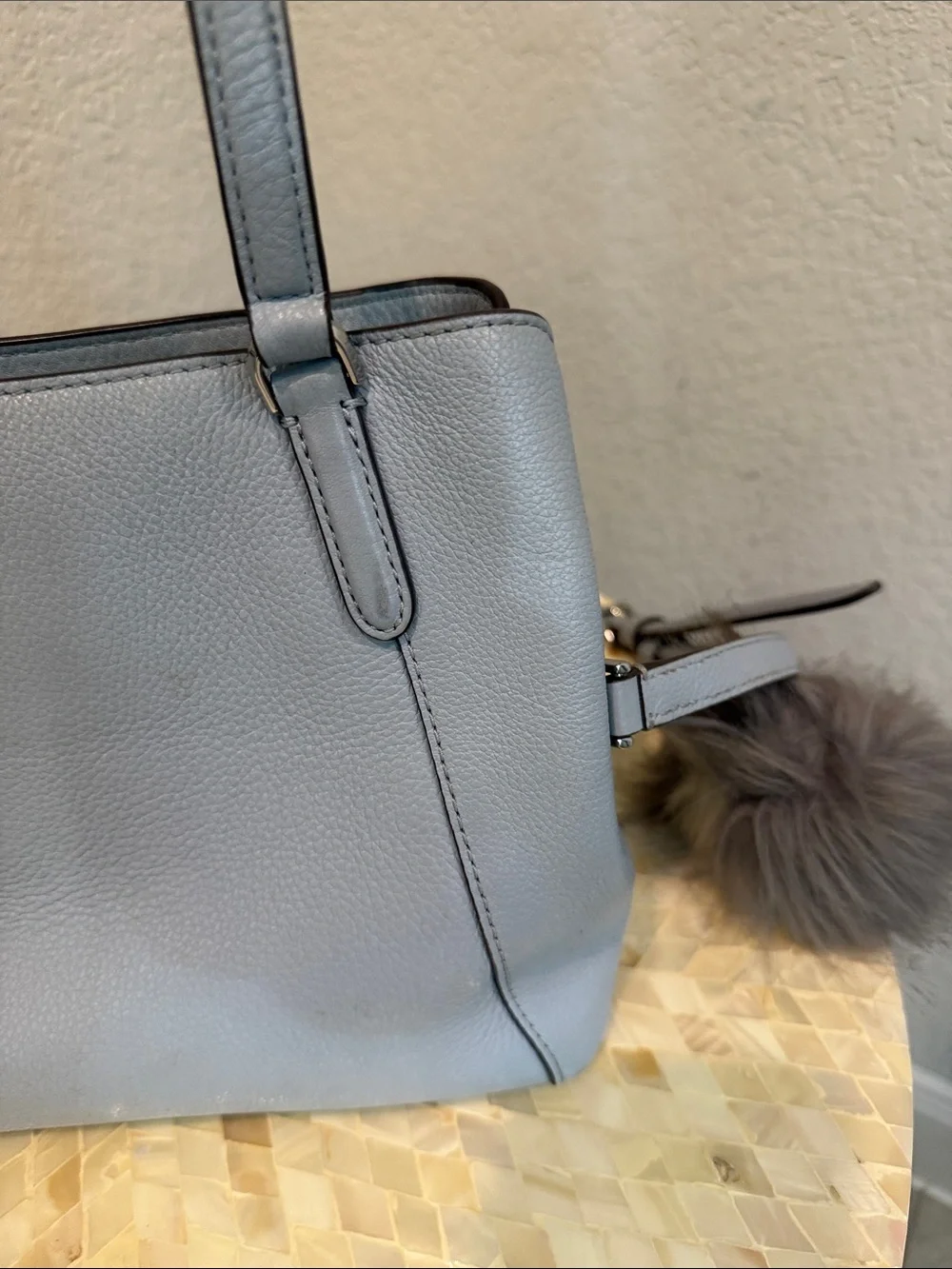 Kate Spade pale blue pebbled leather satchel with charm
